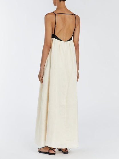 Zwart-witte maxi-jurk met losse bretels en patchwork